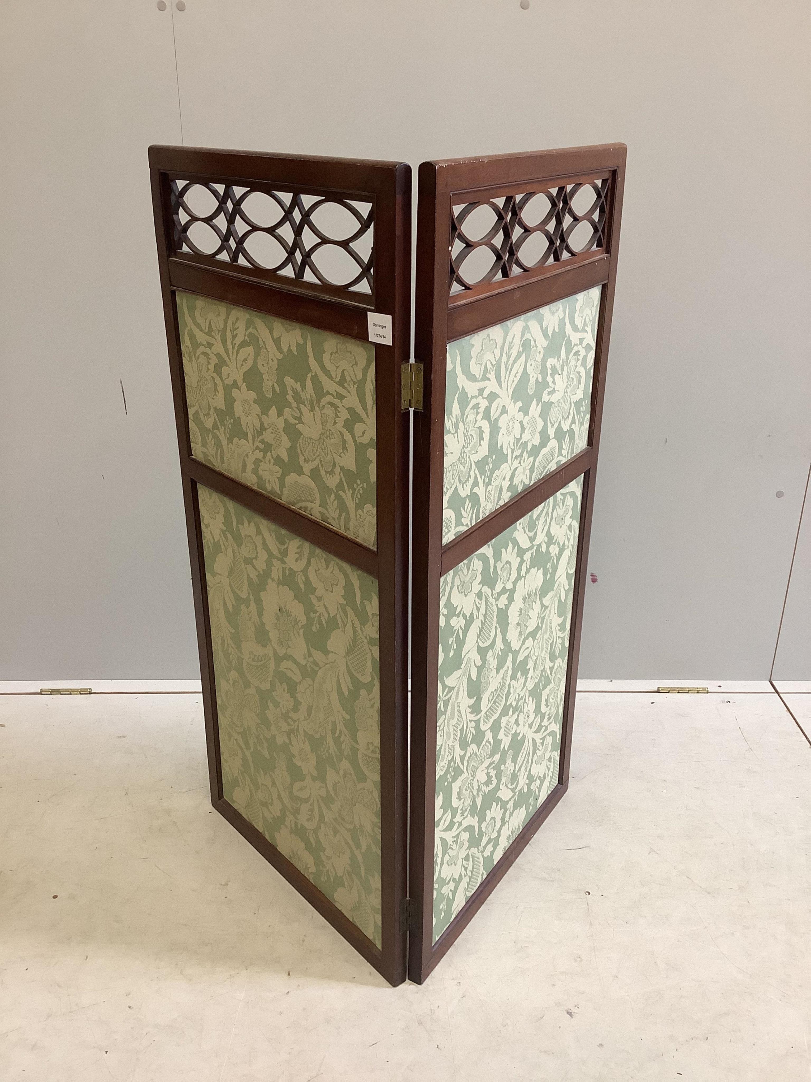 An Edwardian mahogany two fold screen, each panel width 53cm, height 113cm. Condition - fair